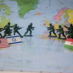 The headlines arrive faster than anyone can process them. Missile strikes. Warnings of retaliation. Oil markets jolt as tensions rise around the Strait of Hormuz. Governments scramble to evacuate citizens. Across television studios and diplomatic corridors, the same uneasy question returns: when will this conflict stop?